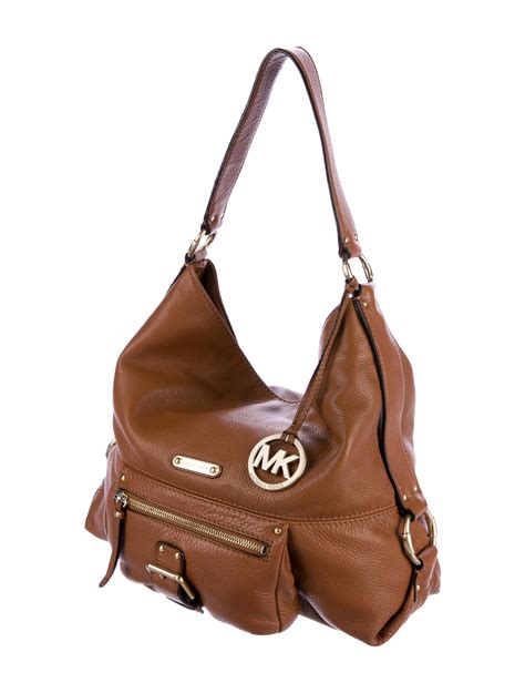 michael kors leather barrel bag|Michael Kors leather bags real.